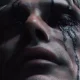 Death Stranding: Due nuovi poster raffigurati Guillermo del Toro e Mads Mikkelsen